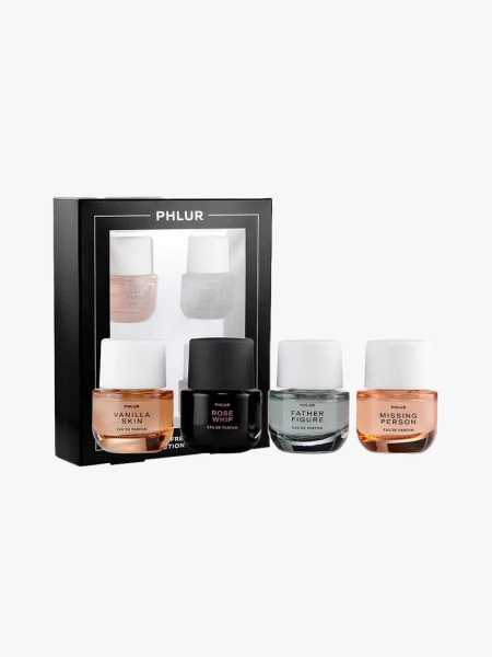 Phlur Mini Perfume Sampler Set in branded components on a light gray background
